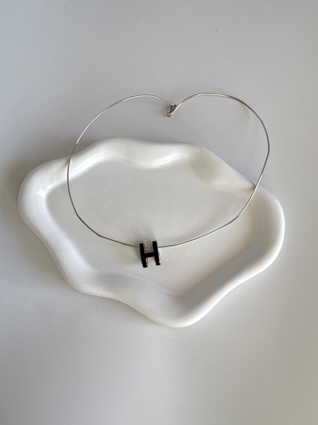 Hermès Pop H Necklace – Black Enamel Pendant on Silver Wire Choker